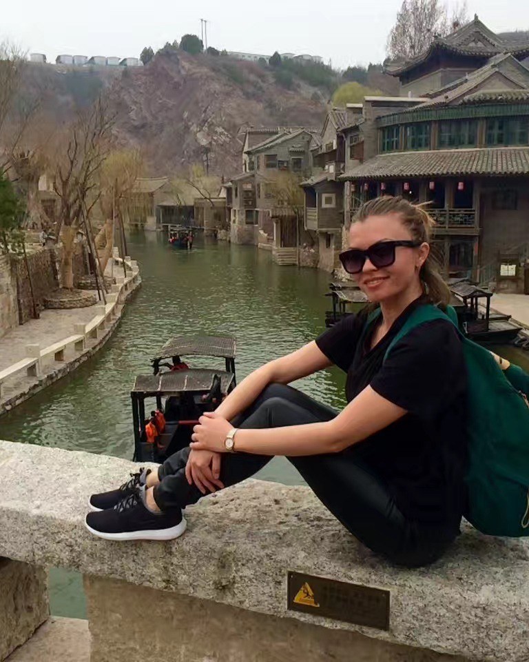 Alisa travelling in a traditional Chinese water town