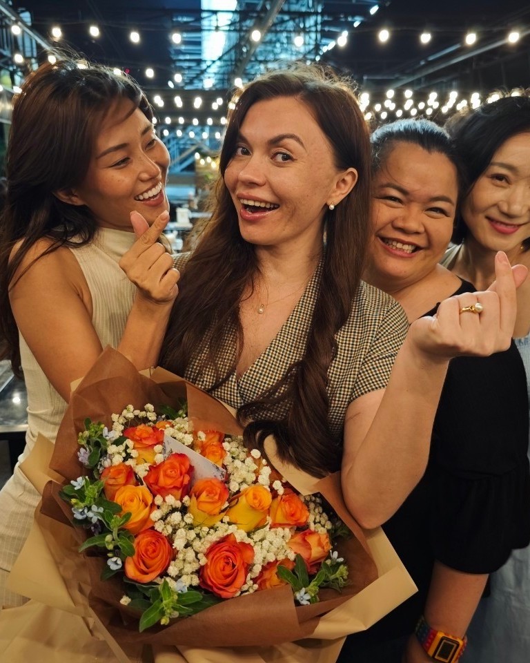 Alisa celebrating with friends in China